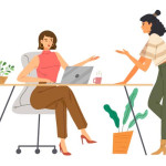 Ilustracija dviju poslovnih žena koje razgovaraju u uredu pored radnog stola s prijenosnim računalom