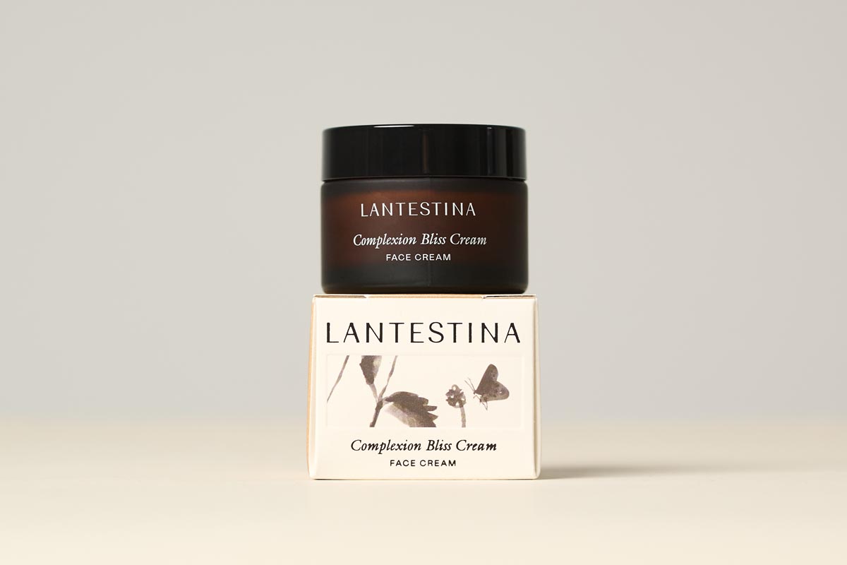 Lantestina Complexion Bliss Cream krema za lice u tamnoj staklenoj posudici s pripadajućom kutijom